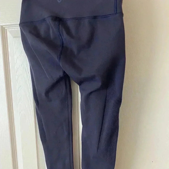 Lululemon set of cropped leggings with mesh on side 
Sz small navy blue & black - Picture 16 of 16